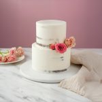 Wedding two tiers half masked cake