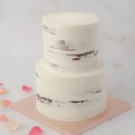 Wedding cake two tiers half masked