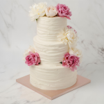 three tier ruffled wedding cake