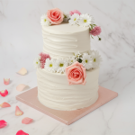 two tier ruffled wedding cake