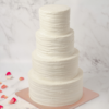 four tier ruffled wedding cake