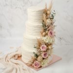 Wedding cake four tiers ruffled pampasgrass roses