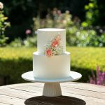 Wedding two tiers masked roses cake