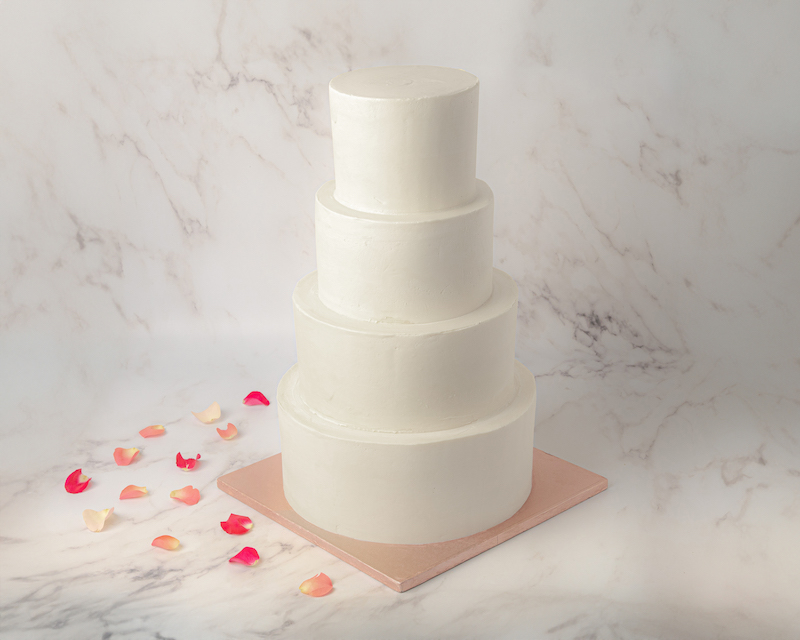 Wedding four tiers masked cake arapina